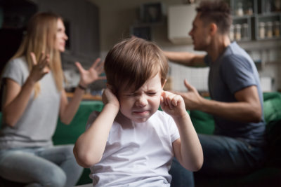 boy suffering from family conflicts