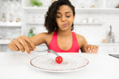 young black woman dealing with anorexia nervosa